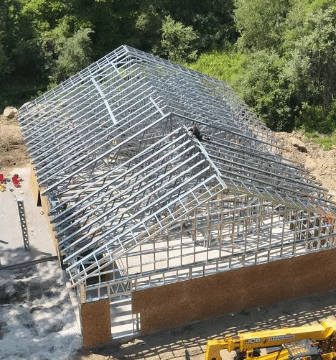Aerial view of steel frame barndominium construction in Indiana